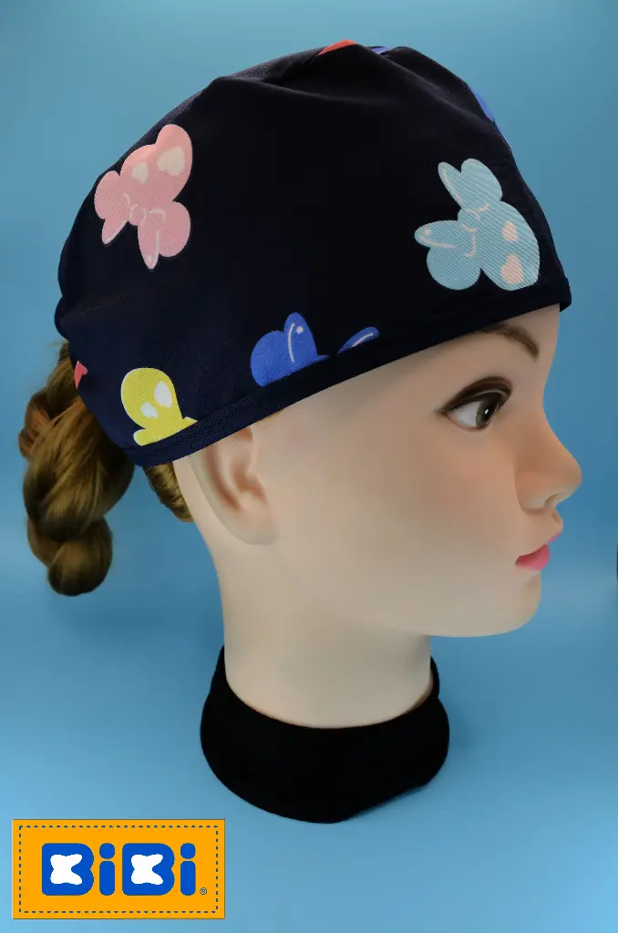 Minnie de colores fondo azul (Gorro Corto (Medidas: 9.5 cm de altura, 58 cm de circunferencia, con cintas para amarrar))
