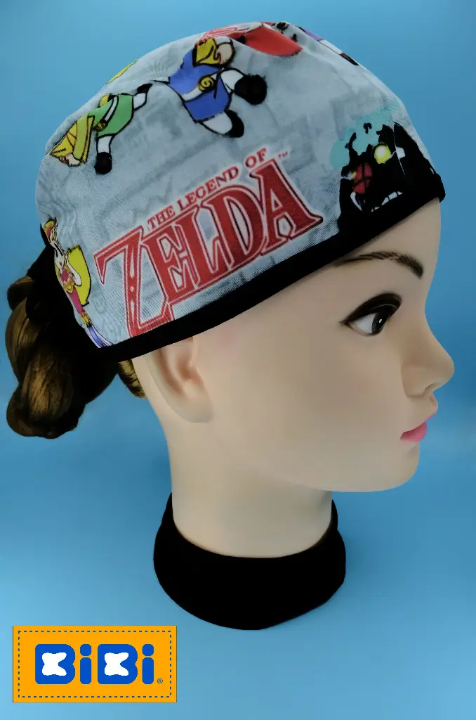 Zelda, fondo gris (Gorro Corto (Medidas: 9.5 cm de altura, 58 cm de circunferencia, con cintas para amarrar))
