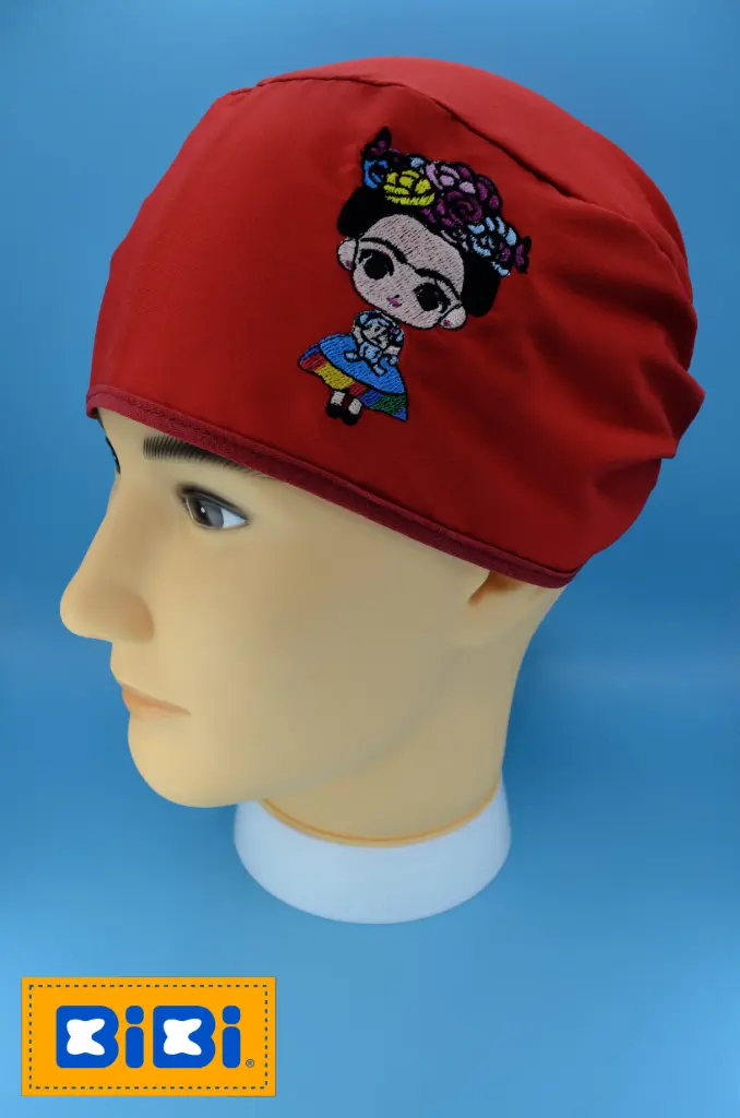 Frida (Gorro Corto (Medidas: 9.5 cm de altura, 58 cm de circunferencia, con cintas para amarrar))