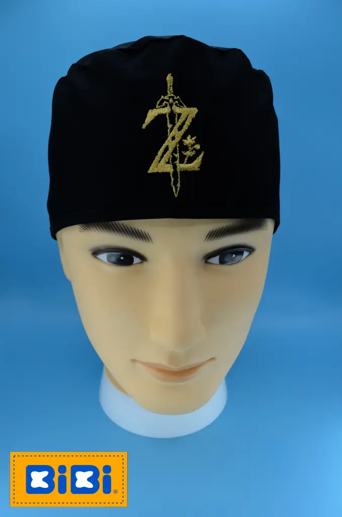 Logo Zelda dorado (Gorro Corto (Medidas: 9.5 cm de altura, 58 cm de circunferencia, con cintas para amarrar))