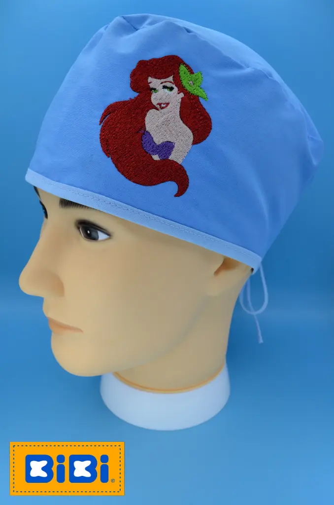 Ariel (Gorro Corto (Medidas: 9.5 cm de altura, 58 cm de circunferencia, con cintas para amarrar))