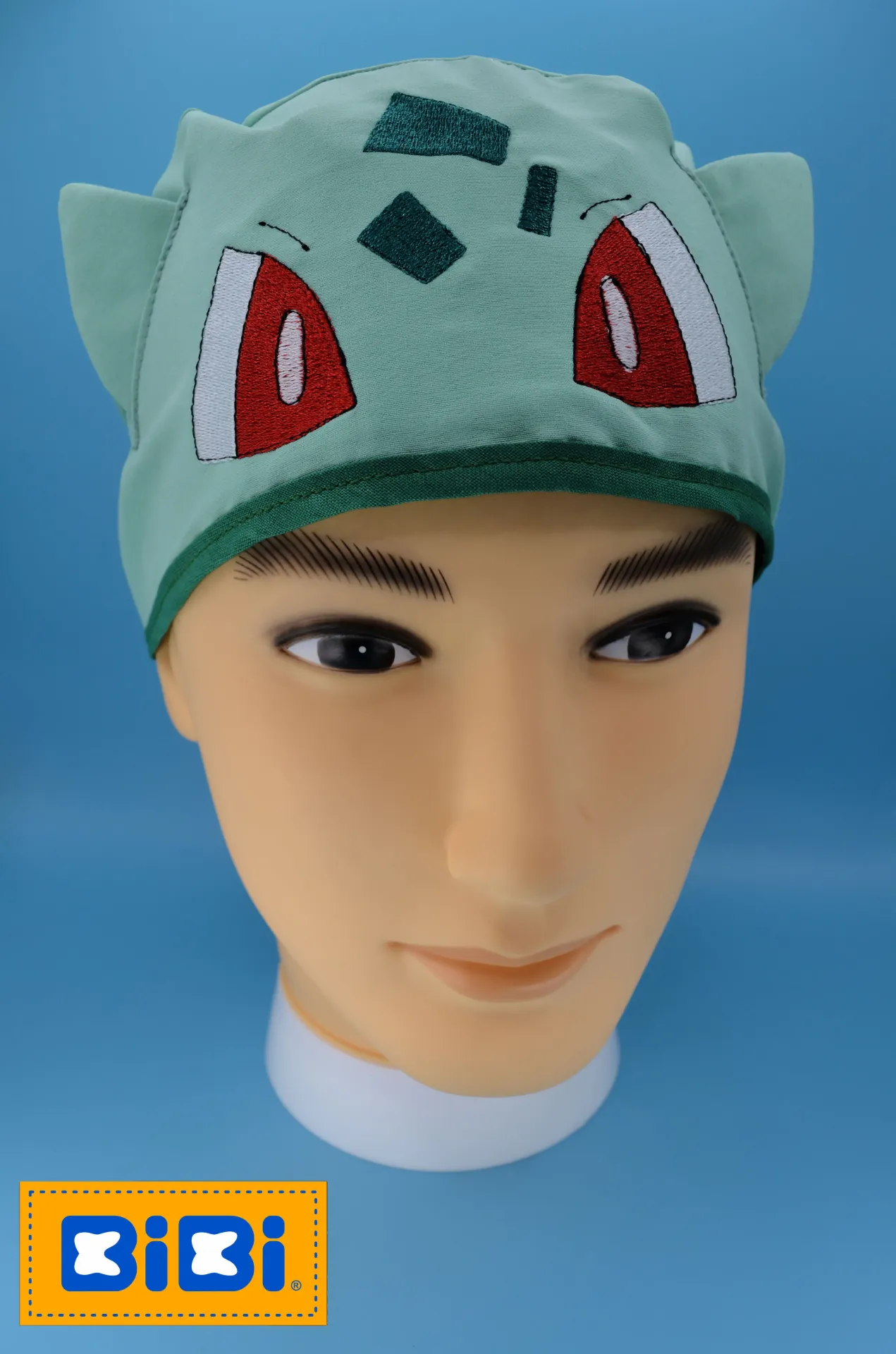 Bulbasaur (Gorro Corto (Medidas: 9.5 cm de altura, 58 cm de circunferencia, con cintas para amarrar))